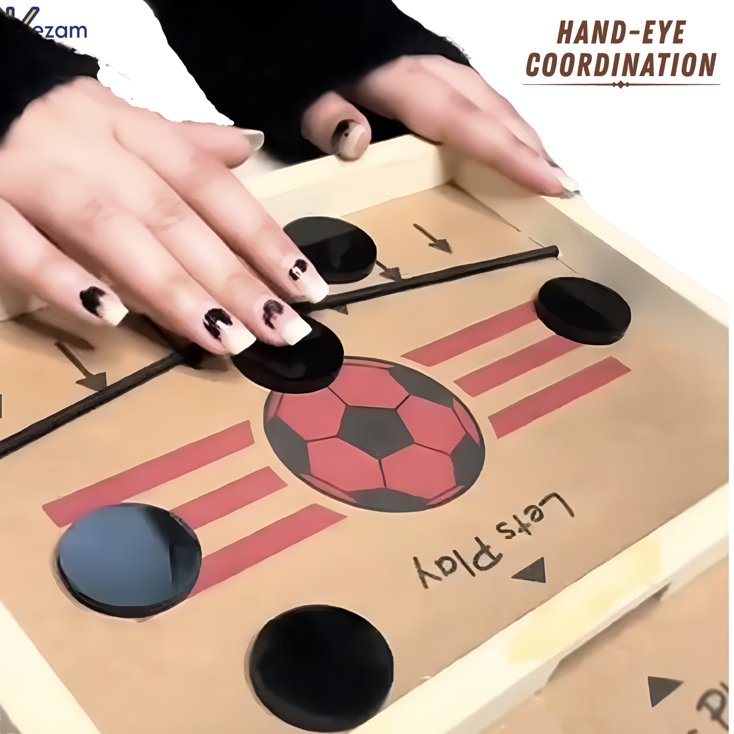 Hands controlling string hockey game board showing hand-eye coordination development through interactive gameplay